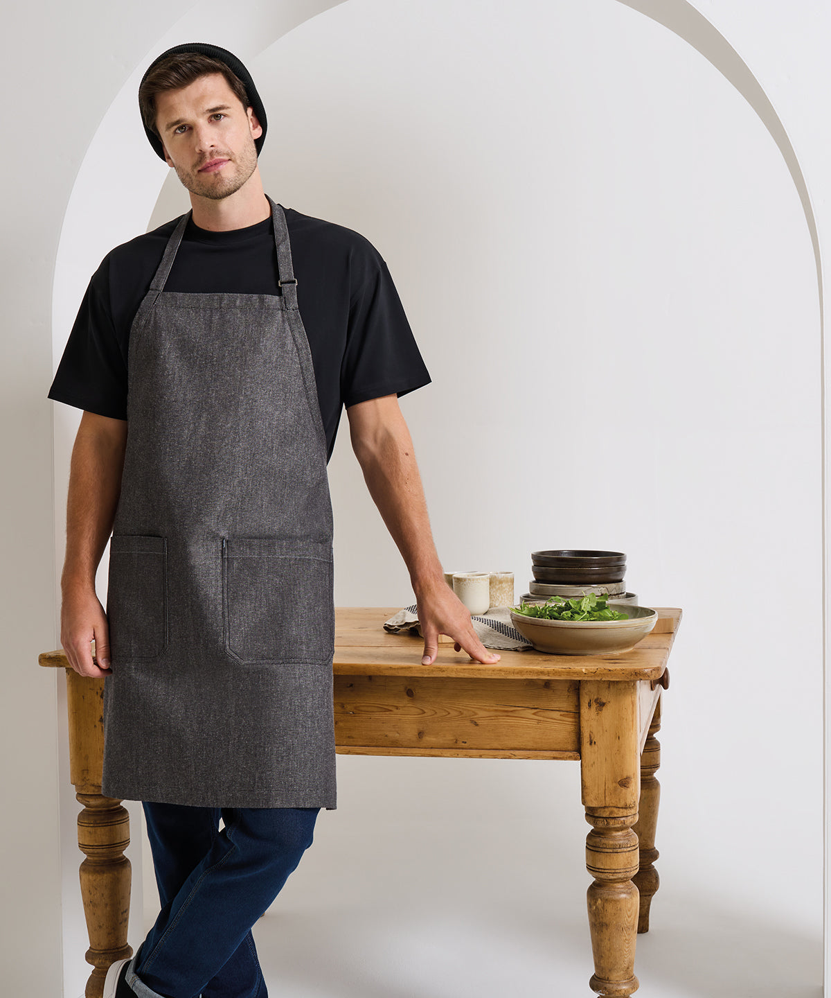 Cotton denim bib apron, organic and Fairtrade certified — lifestyle